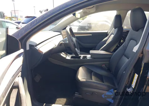 2023 Tesla Model Y Awd/Long Range Dual Motor All-Wheel Drive z USA, uszkodzony, nr VIN 7SAYGDEE4PA137965